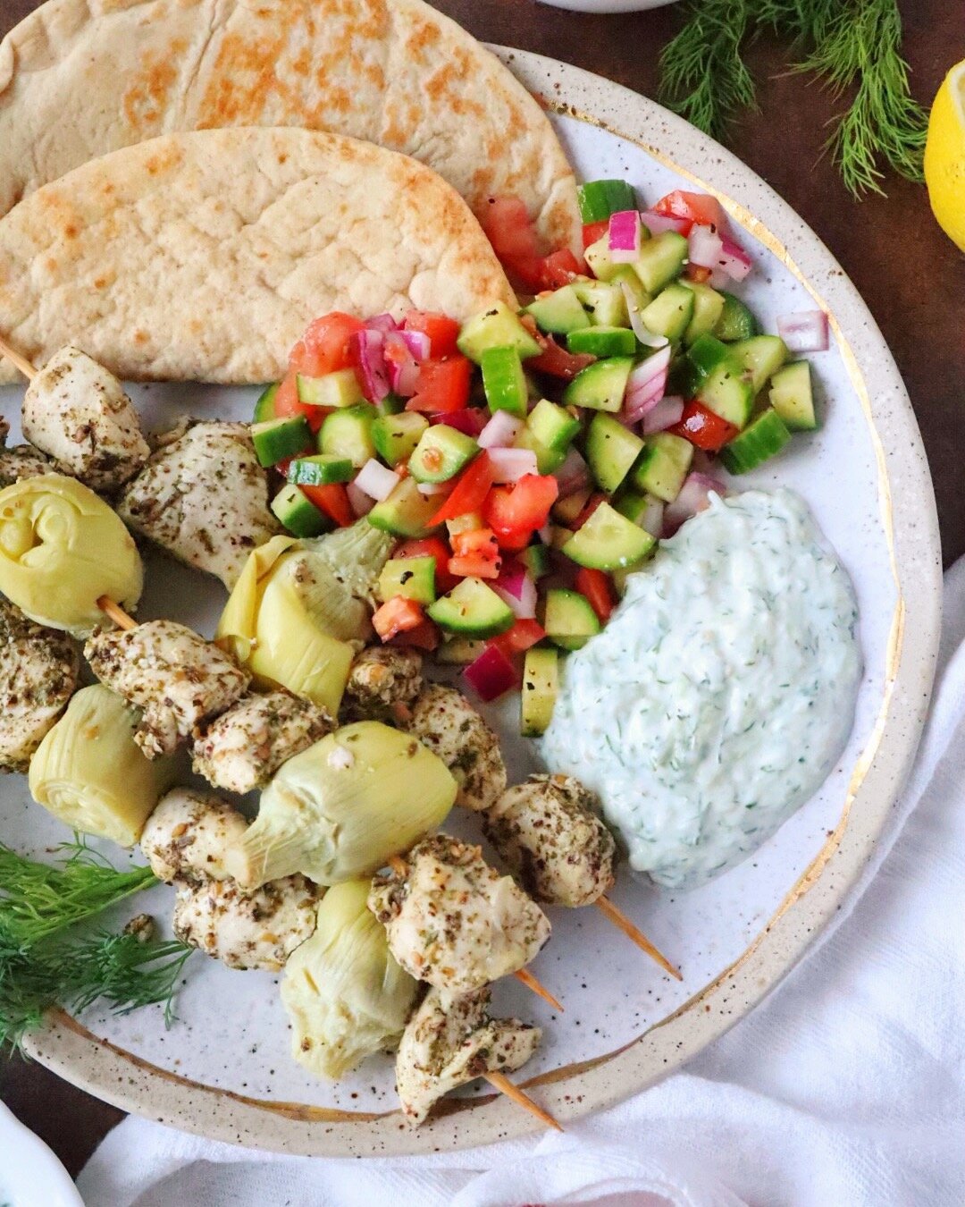 Za'atar Chicken Skewers with Tzatziki and Tomato Cucumber Salad
